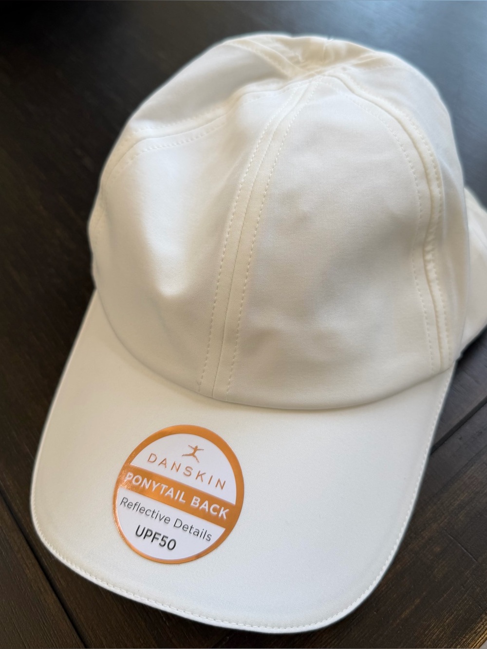 Danskin White Performance Ponytail Cap with Reflective Detail